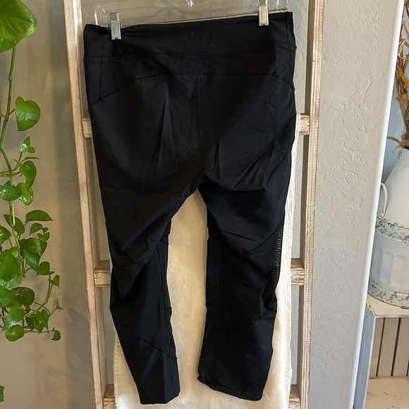 Black Nike Dri-fit Women’s Leggings with cutouts - Picture 2 of 4